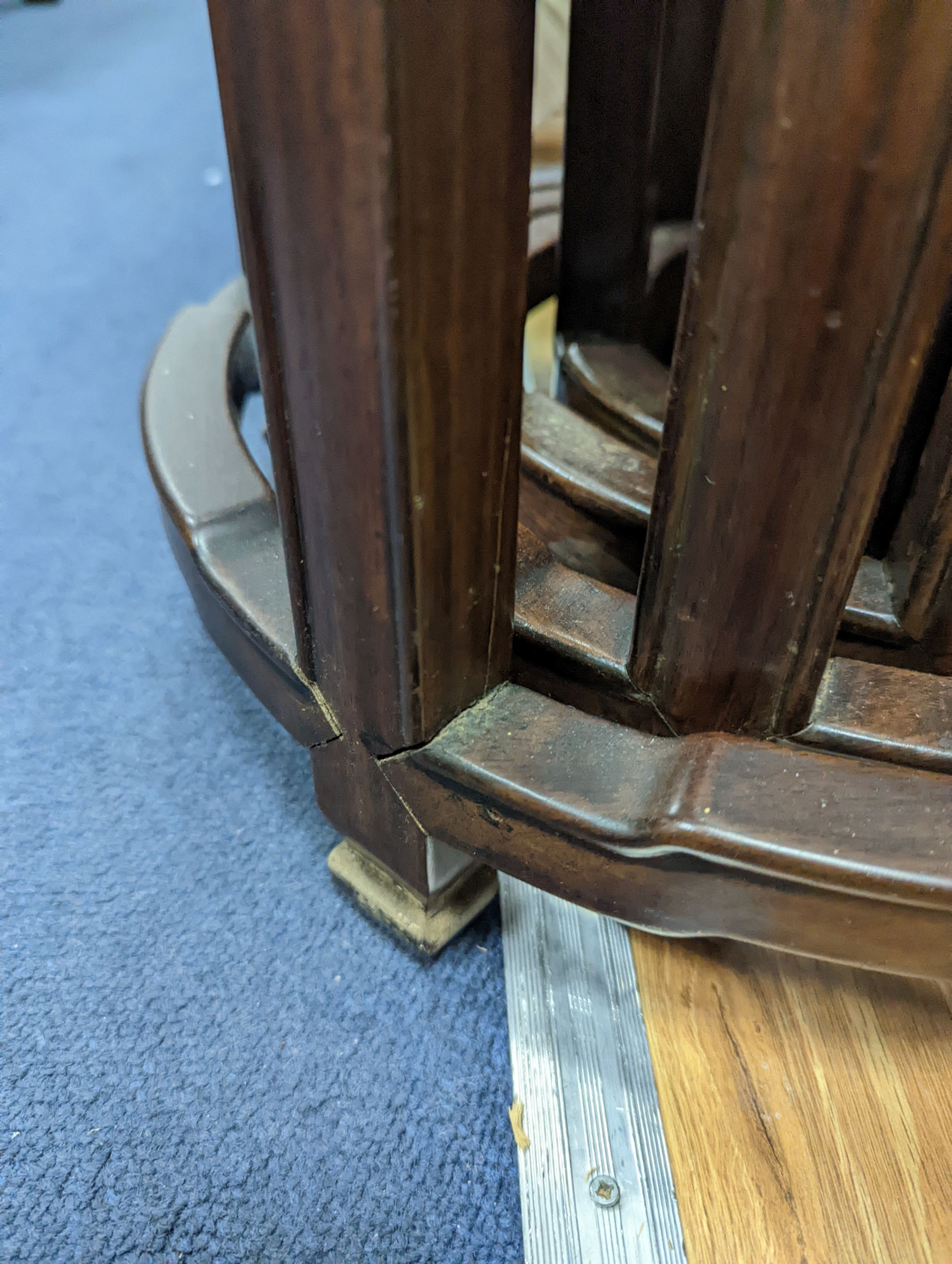 A nest of four Chinese hardwood circular tables, largest diameter 40cm, height 67cm